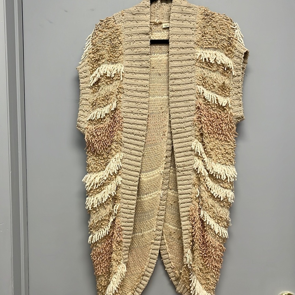 Moth sweater loose knit.